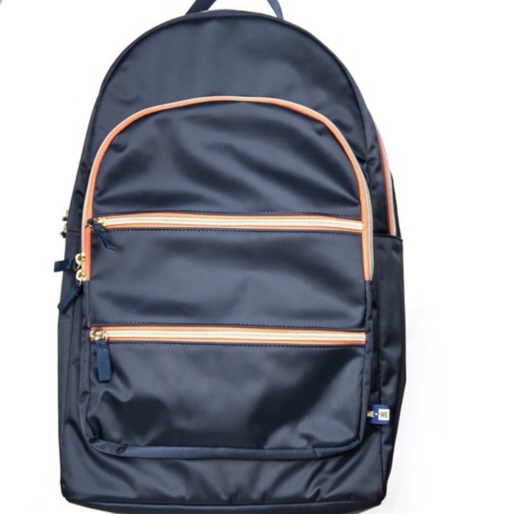 Me to We Navy Backpack with Coral Accents multizip